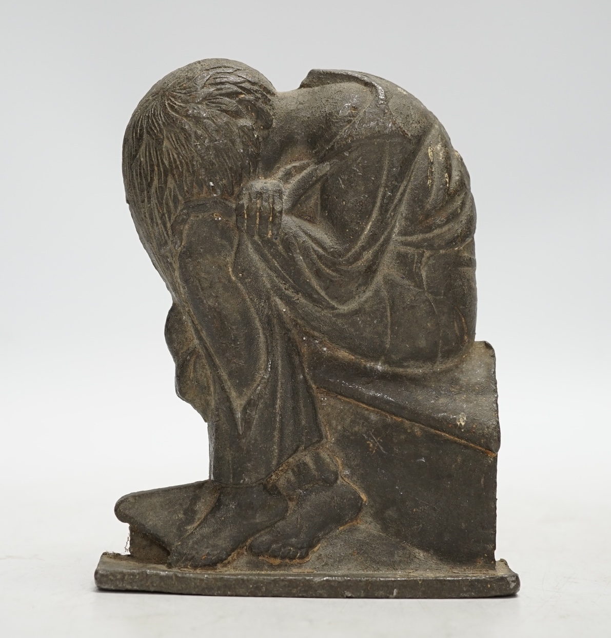 From the Studio of Fred Cuming. A lead study of a crouching figure, 15cm high. Condition - fair